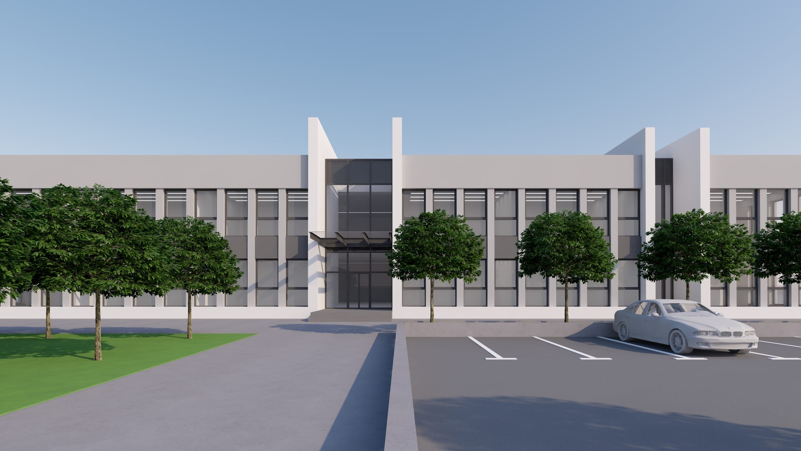 Școala Ocolna — perspectivă frontală cu aliniament de arbori